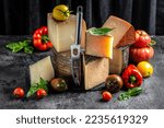Small photo of Cheese board of various types of soft and hard cheese. spanish manchego cheese, International dairy delicacies