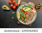 juicy chicken breast grilled with vegetables, Ketogenic diet. Low carb high fat breakfast. Healthy food concept. place for text, top view,
