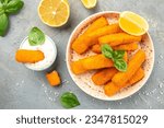 crispy fish steak, fish fingers served with tar tar sauce on a light background. banner, menu, recipe place for text, top view.