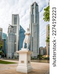 Small photo of SINGAPORE - FEBRUARY 7,2023 - View at the Statue of Sir Stamford Raffles in the streets of Singapore. Singapore is a sovereign island country and city-state in maritime Southeast Asia.