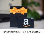 Small photo of Washington, D.C. / USA - July 10, 2019: A $50 Amazon gift card allows the recipient to purchase items from the Amazon.com website.
