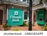 Small photo of Lewes, Delaware / USA - Aug. 19, 2019: Citizens Financial Group, Inc. is an American bank headquartered which operates all along the East Coast. A thunderstorm passes one near Rehoboth Beach.