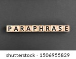 Small photo of paraphrase - word from wooden blocks with letters, rewrite retelling using other paraphrase words concept, top view on grey background