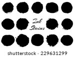 set of black round ink stains.... | Shutterstock .eps vector #229631299