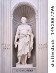 Small photo of Father of botany and taxonomy: Dioscorides. Statue from public building facade in Palermo, Italy