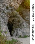Small photo of Helme caves on a sunny summer day. Located in the manor park of the same name, the Helme caves, are an unrivalled sight in Estonia.