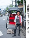 Small photo of June 24, 2014. Portrait image Of Kyoto Jinrikisha Driver. Kyoto, Japan.