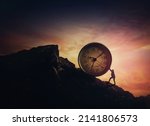 Small photo of Surreal scene with a businessman pushing a clock up a hill. Time management as business concept. Schedule efficiency, deadline planning and control