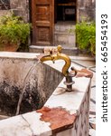 Small photo of Antique Water Tap in Ancient City of Damascus (Syrian Arab Republic)