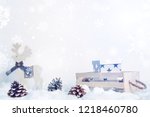 white wooden reindeer  cones in ... | Shutterstock . vector #1218460780