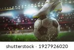 Small photo of Close up of a soccer striker ready to kicks the ball at the stadium