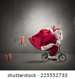 Fast Santa Claus On A Small Bike