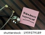 Small photo of Hidradenitis Suppurative write on sticky notes isolated on Wooden Table. Selective focus on Hidradenitis SUppurative text