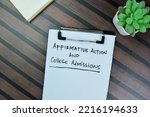 Small photo of Concept of Affirmative Action and College Admissions write on paperwork isolated on Wooden Table. Selective focus on affirmative action and college admissions text