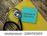 Small photo of Concept of Hidradenitis Suppurative write on sticky notes isolated on Wooden Table.