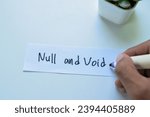 Small photo of Concept of Null and Void write on sticky notes isolated on white background.
