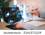 Small photo of Government tax finance research and calculation tax refund concept businessman pointing to document icon on virtual screens filling online tax return form for annual tax payment over the internet