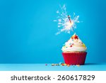 Cupcake With Sparkler Against A ...