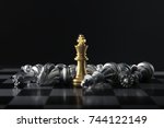 Chess (King wins the game) on black background. Success, business strategy, victory, win, winner, intellect, tactics, defeat, beat, knock, checkmate, leader or leadership concept.