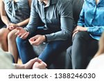 Counseling and conversation in group therapy or meeting. Man sharing story to community. Casual business people in discussion. Peer support, trust and empathy. Treatment together in help center.