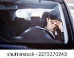 Small photo of Sad man in car. Accident in traffic. Tired sleepy driver. Sick with headache or migraine. Anxiety, stress, despair or depression. Exhausted after driving. Problem with insurance. Pensive person.