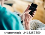 Small photo of Old senior woman and phone password number code against online scam. Cyber security. Elder mature person protect bank data with pin lock. Fraud and hoax safety. Privacy from hacker and scammer online.