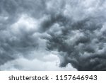 Small photo of Cloudy dramatic dark gray stormy sky. Concept of danger presentiment
