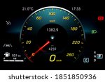 Car dashboard panel including speedometer with red needle, odometer, fuel gauge, lane assist icon, gear position indicator and dipped beam headlights. Modern car digital LCD instrument cluster. 