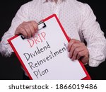 Dividend Reinvestment Plan DRIP is shown on the conceptual business photo