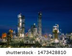 Small photo of Gas storage sphere tanks in petrochemical plant with twilight sky background, Glitter lighting of industrial plant, Manufacturing of vinyl chloride monomer plant