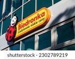 Small photo of Warsaw, Poland - May 10, 2023: View of the Biedronka (Ladybug) logotype - popular store