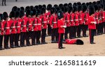 Small photo of London UK, June 2022. Soldier in uniform faints during the Trooping the Colour military parade rehearsal, marking Queen Elizabeth's Platinum Jubilee.