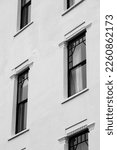 Small photo of London UK. February 2023. Northcote Mansions in Hampstead Square, Hampstead, London, UK. Beautiful residential white painted building with architectural detail.