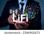 Small photo of LiFi (Light Fidelity), Businessman used smartphone with new technology for internet connection. Business, technology, internet and networking concept, businessman showing hi-speed connection.