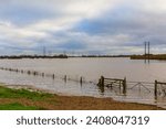 Small photo of Storm Henk, the River Aire bursts its banks and floods the agricultural fields around the villages of Birkin and West Haddlesey near Selby, North Yorkshire in December 2023. Horizontal. Copyspace.