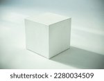 White cube on a white background