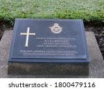 Small photo of Kanchanaburi, Thailand, January 26, 2013: Tomb of R.T. Bussey at the World War II Army Fighters Military Cemetery in Kanchanaburi, Thailand.