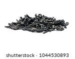 Small photo of a bunch of dry tea leaves, a large leaf black Bayh tea front view, short focus. on white