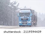 Small photo of Abington, UK - Friday 4th February 2022: Snow showers hit Scotland this morning as temperatures plummet due to a cold front sweeping across the UK. Motorists are pictured on the M74 near Abington