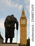 Small photo of London, UK - July 28, 2023; Elizabeth Tower and Big Ben with statue of Sir Winston Churchill in evening light
