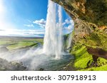 at the back of seljalandsfoss in iceland