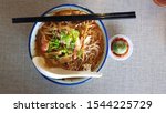 Small photo of Traditional Sarawak laksa is a famous Sarawak noodle dish which looks like the normal curry laksa. However, the Sarawak’s version of this dish is slightly subtler compared to the normal curry laksa. I