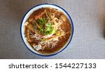 Small photo of Traditional Sarawak laksa is a famous Sarawak noodle dish which looks like the normal curry laksa. However, the Sarawak’s version of this dish is slightly subtler compared to the normal curry laksa. I