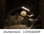Bales Of Hay Being Stored In An ...