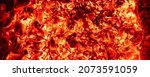 Small photo of Top above overhead detail view od abstract hot red burning wooden coal background in bbq grill brazier or firepit at dark night time. Beautiful inferno heat sparks glowing flaming at hearth stove.