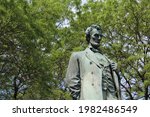 Small photo of CHICAGO - MAY 2021: Lincoln Statue, Lincoln Park, Chicago. Created by sculptor Augustus Saint-Gaudens and unveiled in 1887, the statue is on a list of Chicago statues under consideration for removal.