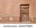 Small photo of Colorful door of Ushaiger heritage village in Saudi Arabia
