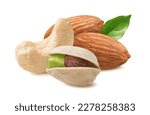 Small photo of Cashew, almond, pistachio in shell and green leaf isolated on white background. Package design element with clipping path