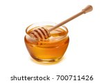 Honey pot and dipper isolated on white background as package design element