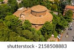 Small photo of Aerial view of the Basilica of St. Stephen in the Round on the Celian Hill in Rome, Italy. It's a minor basilica and Hungary's national church in Rome. Its peculiarity is a circular roof.